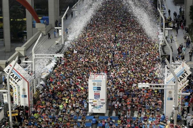 Runners fill the street in front of the Tokyo Metropolitan Government Building at the start of the Tokyo Marathon 2016 in Tokyo, Japan, February 28, 2016. The world's population will reach 11.2 billion in 2100, according to projections by the United Nations. World Population Day