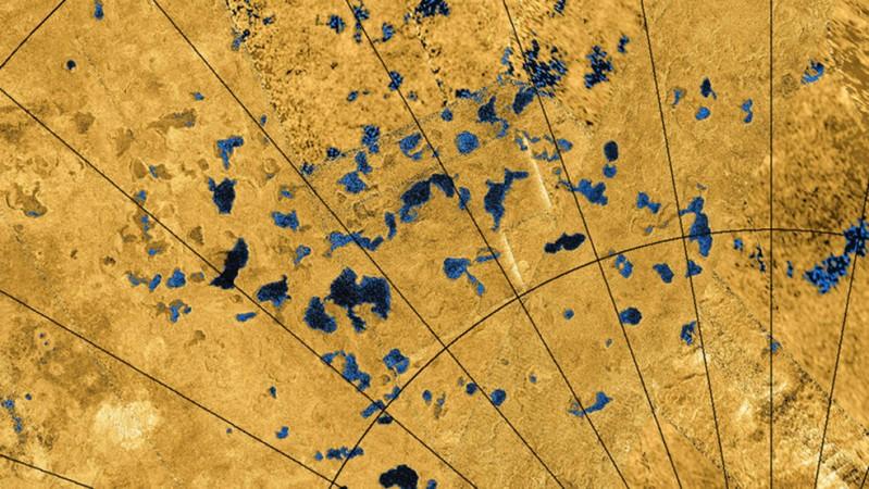 Radar images from NASA's Cassini spacecraft reveal many lakes on Titan's surface, some filled with liquid, and some appearing as empty depressions. nasa, Saturn, Titan, space,