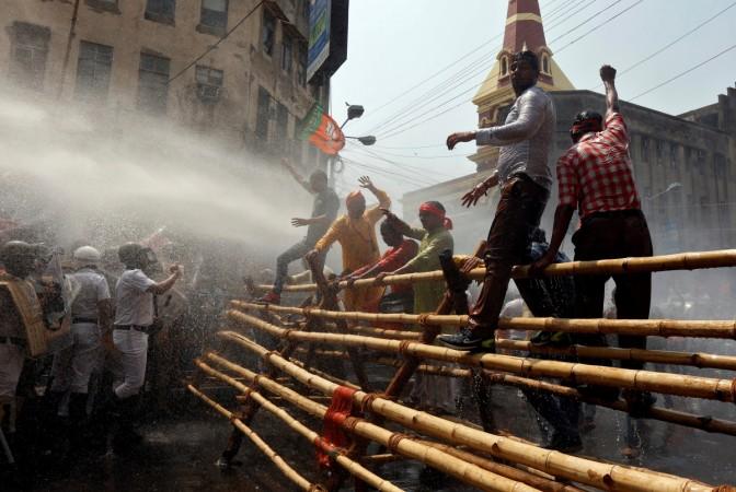 Police use a water cannon to disperse the supporters of India's Bharatiya Janata Party (BJP) during a protest against what they call a breakdown of law and order in the state of West Bengal, in Kolkata, India May 25, 2017. Basirhat