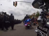 Thousands pay tribute to fallen police officer in moving funeral procession