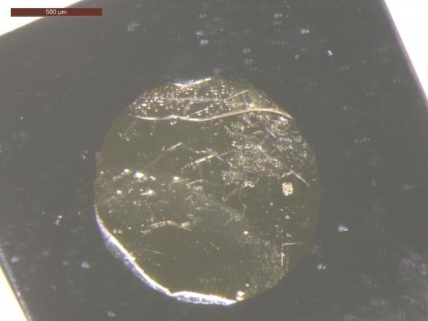 This photo shows a circular water layer sandwiched between a diamond platelet coated with gold and a quartz platelet. The water layer transforms into ice VII after being blasted by an intense green laser. alien ice, ice,