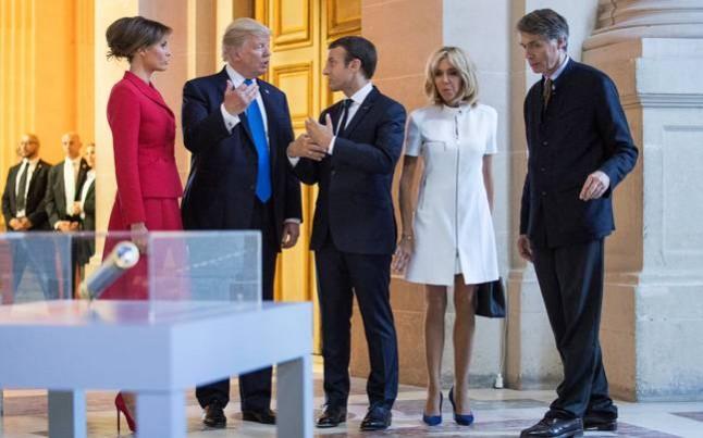 Donald Trump, Melania Trump, Emmanuel Macron, and his wife Brigitte Macron with David Guillet, Director of the Army Museum, tour Napoleon Bonaparte's Tomb at Les Invalides in Paris. Donald Trump
