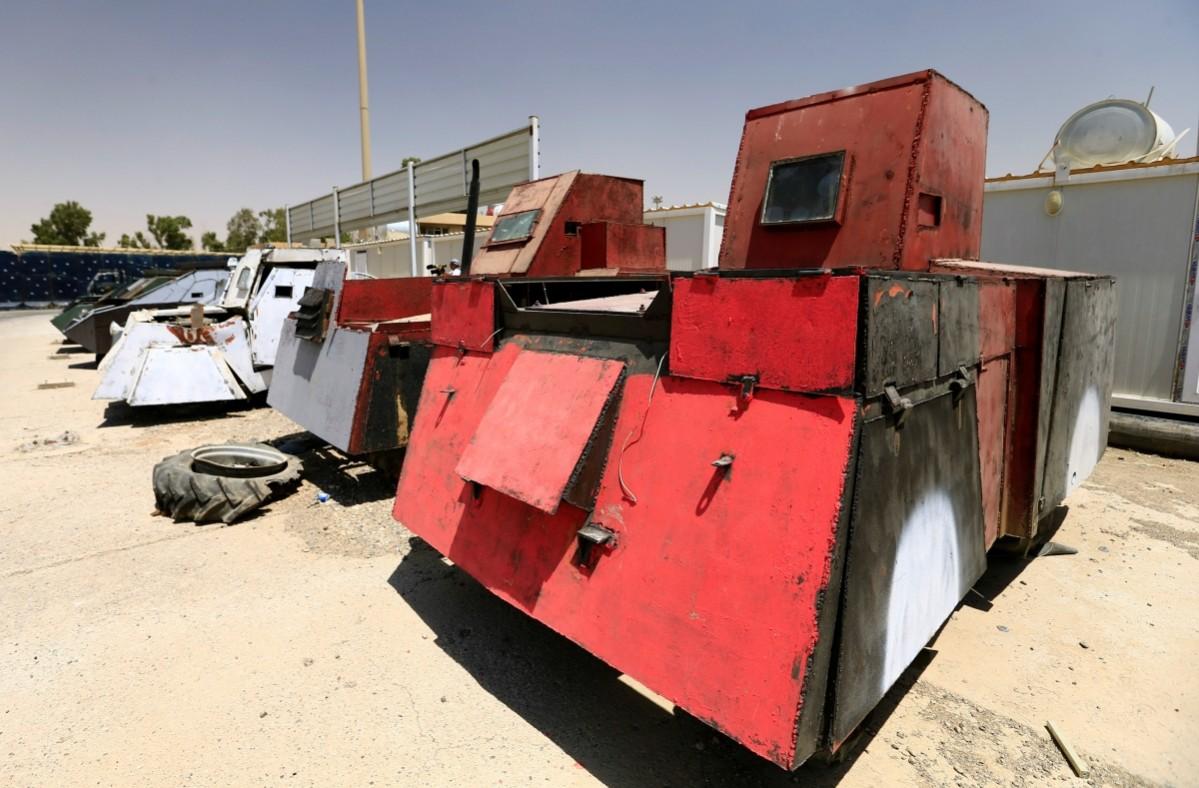 Vehicles used for suicide car bombings, made by Islamic State militants, are seen at Federal Police headquarters after being confiscated in Mosul, Iraq ISIS Mosul, ISIS weapons, ISIS cars