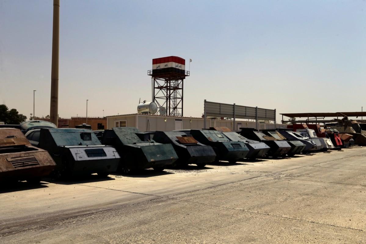 A sneak peek inside the terror weapons garage of ISIS in Mosul. ISIS Weapons, ISIS cars, ISIS Mosul