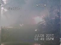 Dramatic footage shows police rescuing campers stranded by Whittier fire