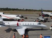 gmr group, hyderabad airport, gmr to sell stake to abu dhabi investment authority, gmr stake sale hyderabad airport