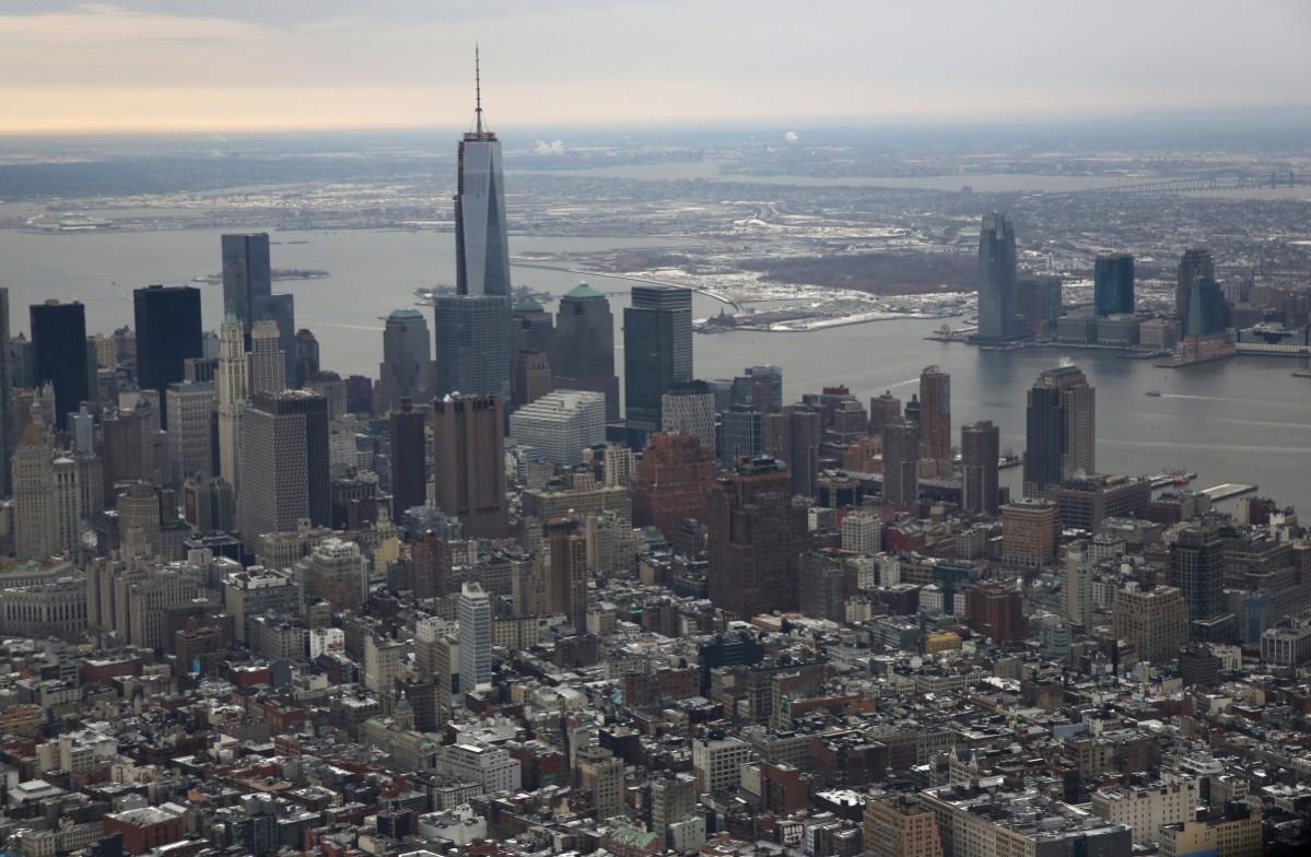 One World Trade Center, the tallest building in the Western Hemisphere, rises over downtown Manhattan as seen from the window of a Customs and Border Protection (CBP), Blackhawk helicopter ahead of Super Bowl XLVIII on January 31, 2014, in New York City. New York