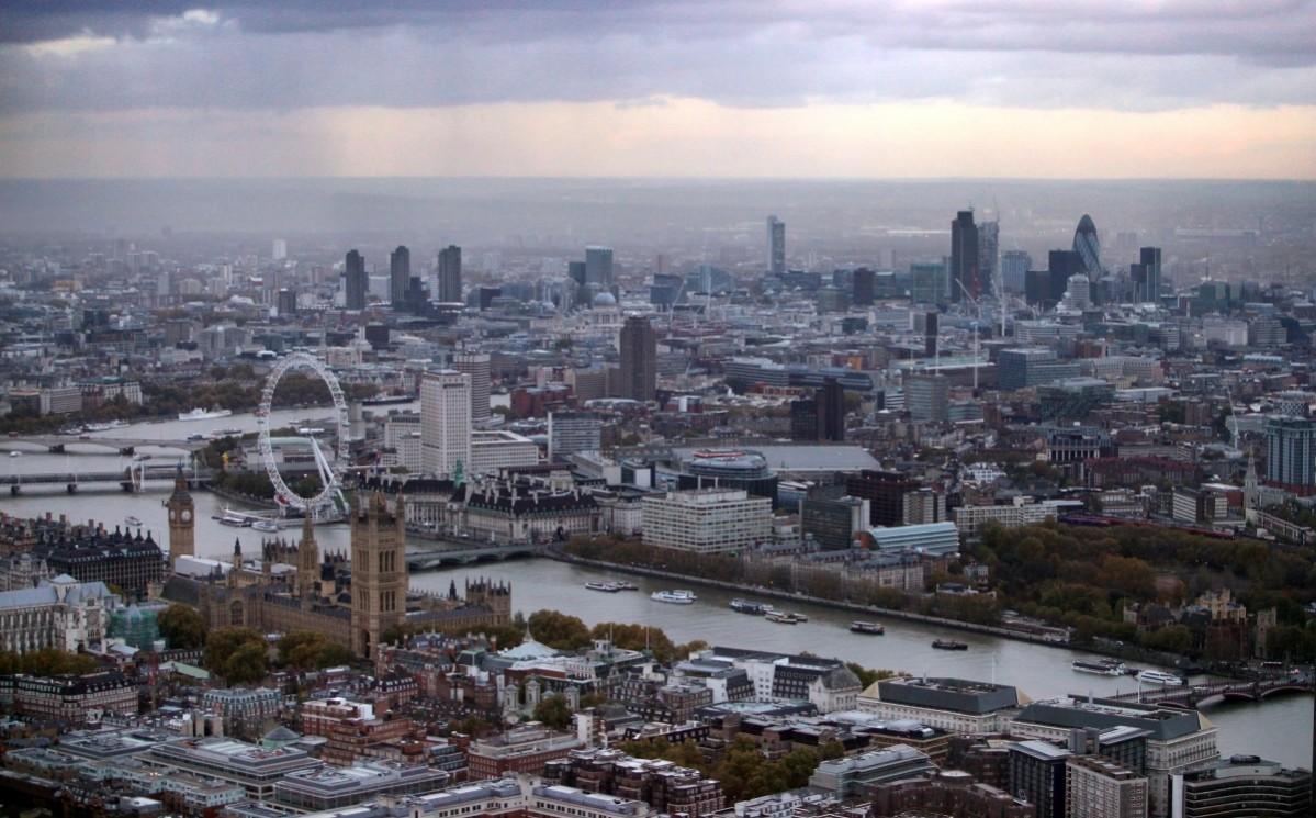 An aerial view of London featuring the Houses of Parliament, the London Eye Ferris wheel and the financial district on November 4, 2009 in London, England. London