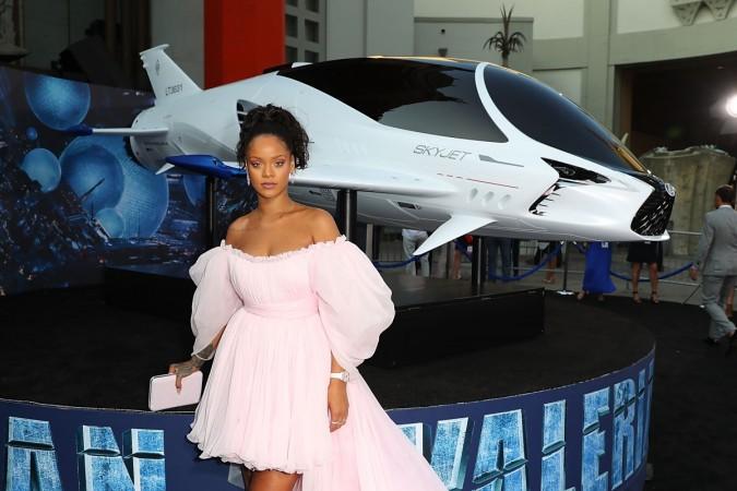 Rihanna poses for a photo with the SKYJET. Rihanna