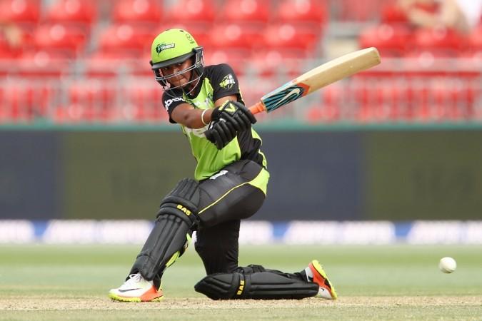 <span>Harmanpreet</span> <span>Kaur</span> of the Thunder sweeps during the <span>WBBL</span> match between the Thunder and <span>Sixers</span> at Spotless Stadium on December 28, 2016 in Sydney, Australia. Harmanpreet Kaur