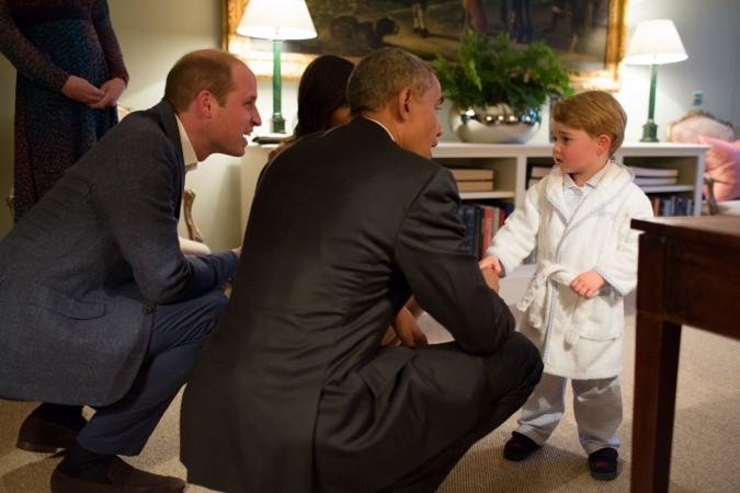 President Barack Obama, Prince William, Duke of Cambridge and First Lady Michelle Obama talks with Prince George at Kensington Palace on April 22, 2016 in London, England. Prince George