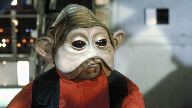 A jowled, mouse-eyed native of Sullust, Nien Nunb. Star Wars