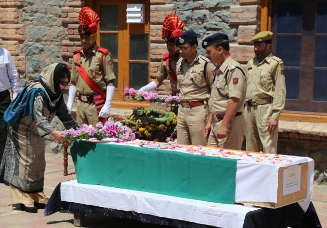 In picture: Jammu and Kashmir chief minister Mehbooba Mufti pays tribute to Deputy Superintendent of Police Mohammad Ayub Pandit who was lynched outside a mosque in Srinagar on June 23, 2017. Mehbooba Mufti