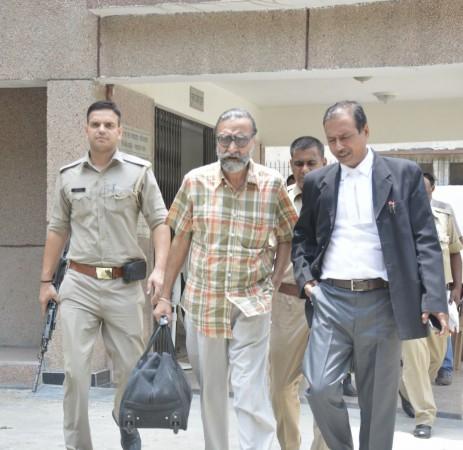In picture: Nithari killings' convict Moninder Singh Pandher being taken away after produced before a CBI court in Ghaziabad on July 22, 2017. Moninder Singh Pandher