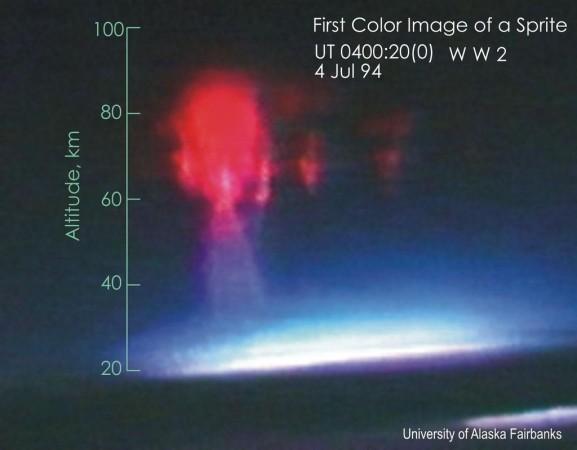 This is the first color image of a sprite that was clicked in 1994 NASA/University of Alaska aircraft campaign to study sprites, with the help of an intensified color TV camera. The red color was due to nitrogen fluorescent emissions excited by a lightning stroke in the underlying thunderstorm. sprites, rare,