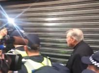 Cardinal George Pell navigates media scrum during court appearance