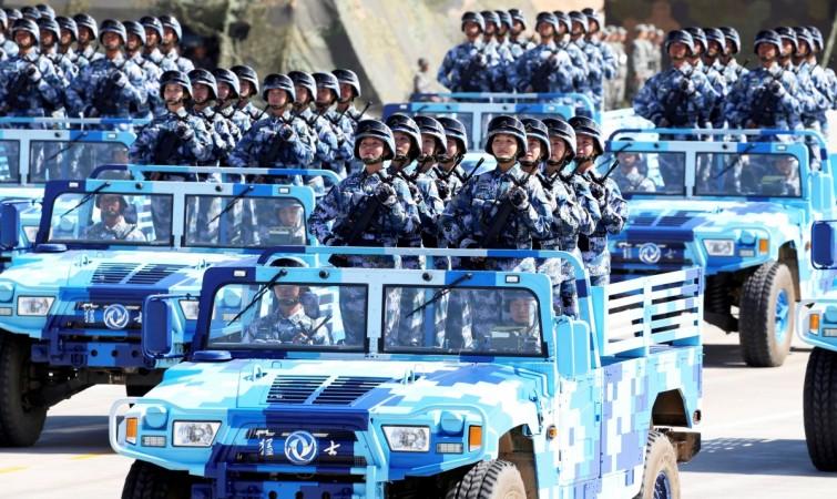 Soldiers of China's People's Liberation Army (PLA) take part in a military parade to commemorate the 90th anniversary of the foundation of the army at the Zhurihe military training base in Inner Mongolia Autonomous Region, China, July 30, 2017. Chinese Army