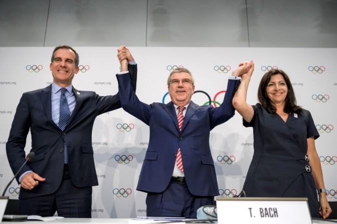 File photo of Los Angeles' Mayor Eric Garcetti (L), International Olympic Committee (IOC)'s President German Thomas Bach and Mayor of Paris Anne Hidalgo (R). Paris 2024 Olympics