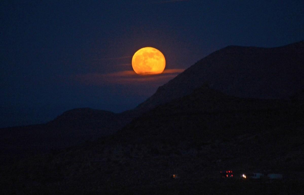 The moon rises near the Little Colorado River Gorge near the Grand Canyon on June 23, 2013. Grand Canyon National Park