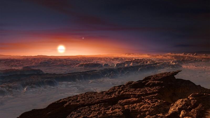 This artist's impression shows a view of the surface of the planet Proxima b orbiting the red dwarf star Proxima Centauri, the closest star to the solar system. nasa, ESO, exoplanet, Proxima b,