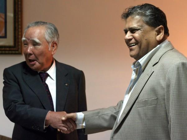 Late Union minister Santosh Mohan Dev (right) shakes hand with Suzuki Motor Corp. Chairman and Chief Executive Osamu Suzuki at a meeting in New Delhi September 6, 2006. Former Union minister Santosh Mohan Dev passes away