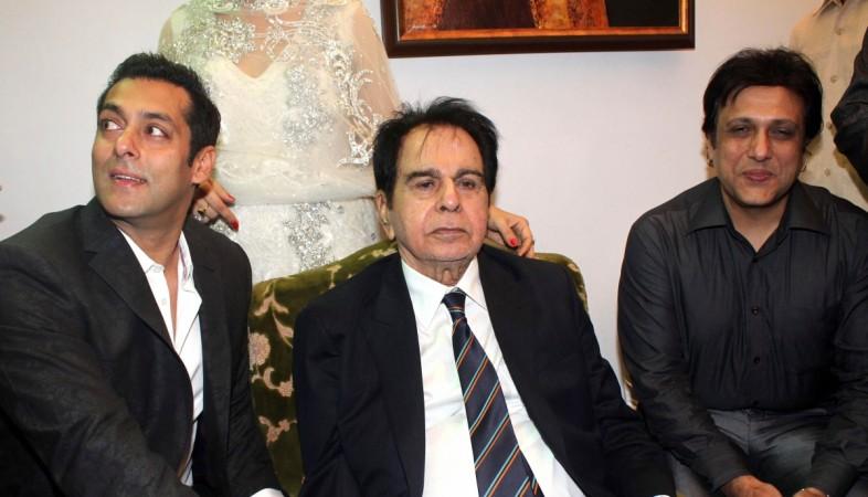 Legendary actor Dilip Kumar (Muhammad Yusuf Khan) (C) with Bollywood actors Salman Khan (L) and Govinda (R) during his 89th birthday celebrations on December 11, 2011, in Mumbai. Dilip Kumar