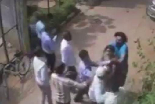 In picture: Images caught on CCTV camera show members of the Uppal family being beaten up by neighbours and some other people on May 13, 2017. Sikh family assaulted