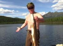 Shirtless Putin poses during fishing trip in Siberia
