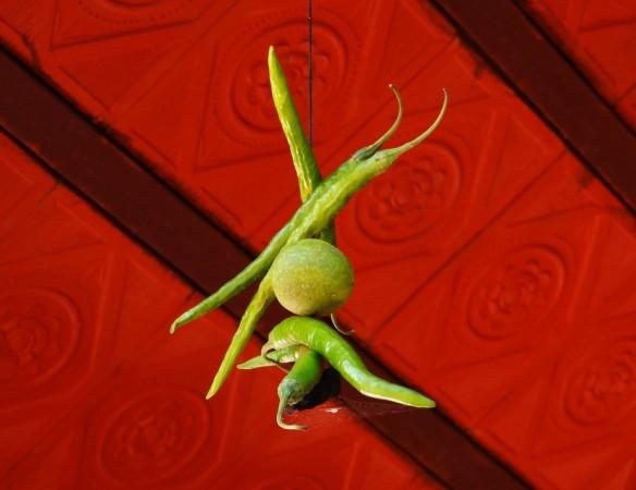 Chillies and lemon tied on house entrance (Representational Image) Superstition