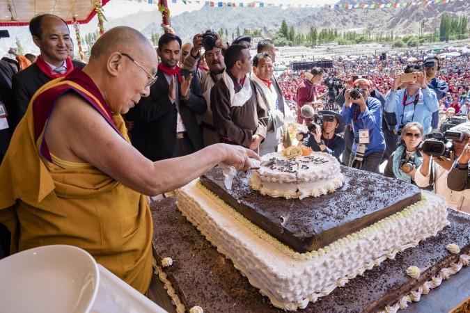 In picture: The Dalai Lama cuts his birthday cake during celebrations in honour of his 82nd birthday in Leh, Ladakh, on July 6, 2017. Dalai Lama