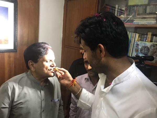 In picture: Ahmed Patel being congratulated after his win. Ahmed Patel