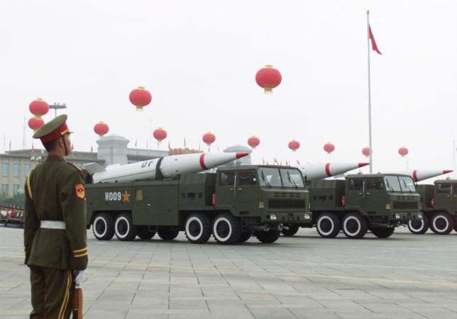 Chinese Dongfeng missiles file past Tiananmen Square in Beijing. Dongfeng missiles
