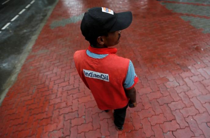 A private security guard wearing a jacket of Indian Oil stands outside a fuel station in New Delhi, India August 29, 2016. REUTERS/Adnan Abidi Indian Oil