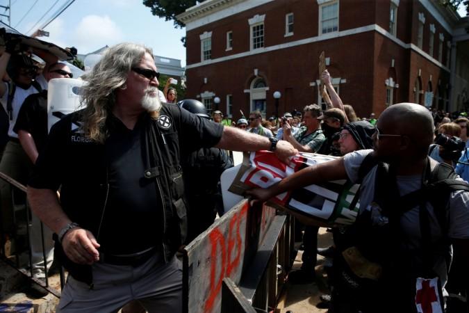 White nationalists clash with a group of counter-protesters in Charlottesville. White nationalists clash with a group of counter-protesters in Charlottesville.