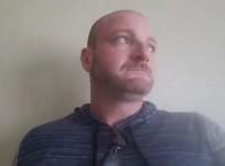White nationalist Christopher Cantwell tears up at thought of being arrested after Charlottesville
