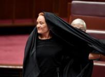 Right-wing Australian senator wears burqa in parliament and calls for the garment to be banned