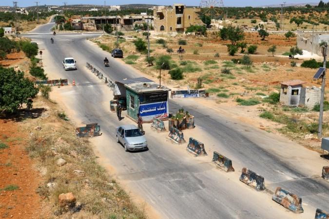 Members from a coalition of rebel groups called ISIS in Idlib