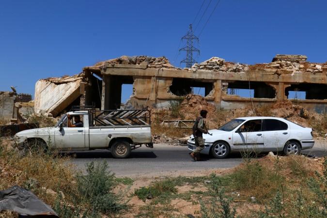 Members from a coalition of rebel groups called ISIS in Idlib