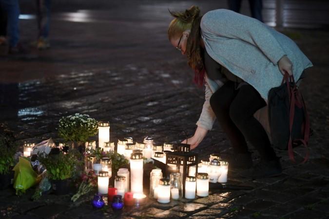 Candles at Turku Market Square for the victims of Friday's stabbings are pictured in Turku, Finland August 18, 2017. Finland Attack