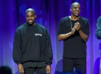 Kanye West (L) and JAY Z