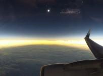 Stunning mid-flight video captures moment total solar eclipse plunges Earth into darkness
