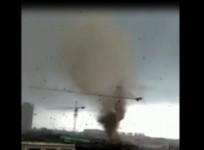 Footage shows tornado swirling above town in northern China