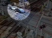 Watch panicky learner driver make destructive mistake at level crossing in Essex