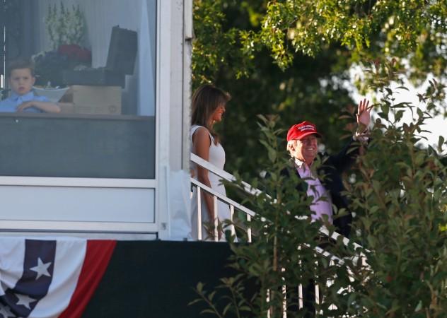 U.S. President Donald Trump and first lady Melania Trump leave the U.S. Women's Open Championship at Trump National Golf Club on July 16, 2017 in Bedminster, New Jersey. Trump golf