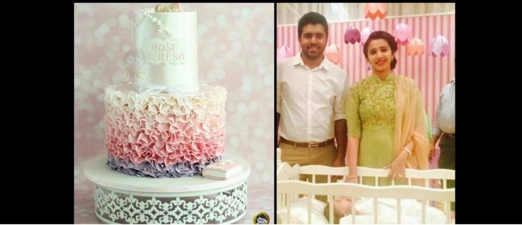 Nivin Pauly and his wife Rinna on their daughter Rose Teresa's baptism ceremony. Nivin Pauly with his family, Nivin Pauly, Rinna Joy, Tose Teresa