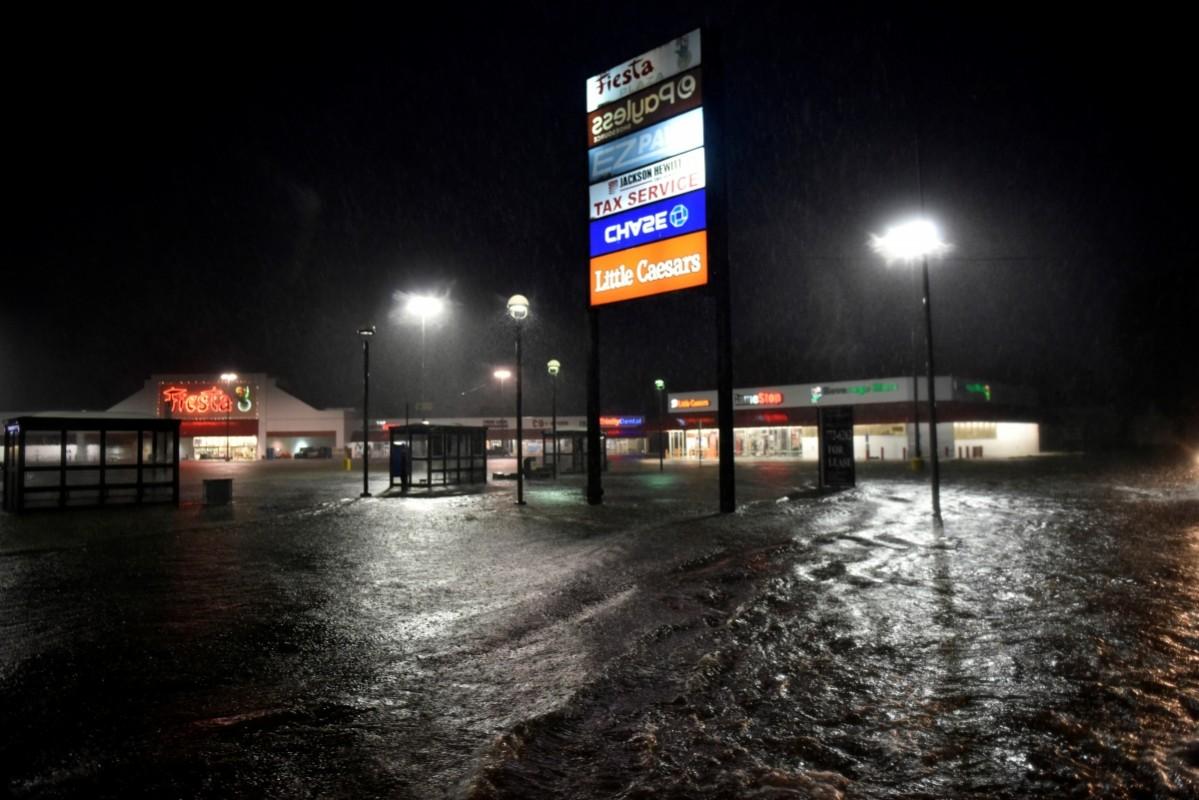 A shopping center is overtaken by floodwater after Hurricane Harvey inundated the Texas Gulf coast with rain causing widespread flooding, in Houston, Houston floods