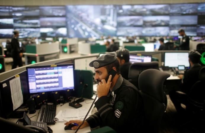 Saudi security guards monitor screens at the National Center for Security Operations in the holy city of Mecca, Saudi Arabia National Center for Security Operations