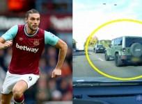 Watch West Hams Andy Carroll speed through oncoming traffic escaping motorbike robbers