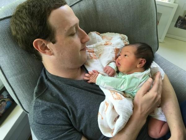 Mark Zuckerberg with daughter August Mark Zuckerberg with daughter August