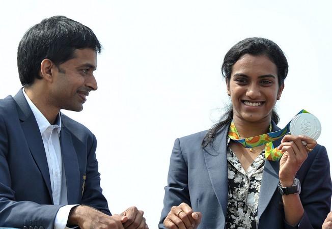 File photo of Pullela Gopichand and PV Sindhu PV Sindhu Pullela Gopichand